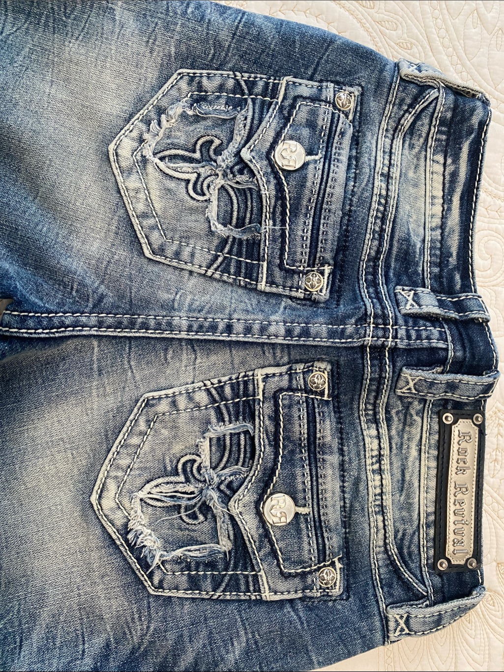 Rock Revival Medium Blue Distressed Bootcut Jeans With Embroidered Pockets